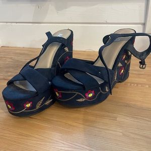 Beautiful dark blue with colorful design. Never worn.